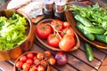 Tomatoes, salad and cucumbers-vegetables for picnic. Outdoors. Royalty Free Stock Photo