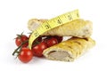 Tomatoes with sausage Roll and Tape Measure Royalty Free Stock Photo