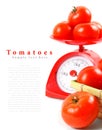 Tomatoes on scales and in a basket. Royalty Free Stock Photo