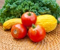 Tomatoes, squash and kale cabbage stems from local garden