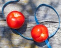 Tomatoes and tape measure Royalty Free Stock Photo