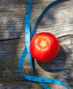 Tomatoes and tape measure Royalty Free Stock Photo