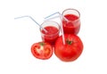 Tomatoes and tomato juice with drinking straws Royalty Free Stock Photo