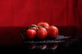 Tomatoes under water drops Royalty Free Stock Photo
