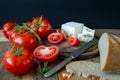 Tomatoes and white greek cheese Royalty Free Stock Photo