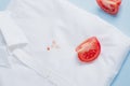 Tomatoes on a white shirt. daily life dirty stain for wash and clean concept