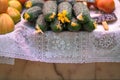 Tomatos and cucumbers with flower on a white tablecloth lace in a market Royalty Free Stock Photo