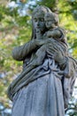 Tomb sculpture of a woman with a child Royalty Free Stock Photo