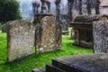 Tombs and headstones in a typical English church graveyard Royalty Free Stock Photo