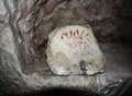 Tombstone with an inscription in Hebrew in the inner room of a necropolis. Bet She`arim, National Park in Kiriyat Tivon city in Is