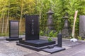 Tombstone named Filmmakers`s Tomb and pagodas in Buddhist Tamonji temple.