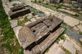 tombstones and old plates with carved khachkars in the daytime