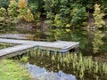 Tomlinson Run State Park in the fall in West Virginia with the fall colors and trees reflecting in the lake