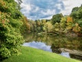 Tomlinson Run State Park in the fall in West Virginia with the fall colors and trees reflecting in the lake Royalty Free Stock Photo