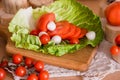 tommaty cherry, fresh greens, lettuce leaf cabbage. The concept of healthy eating. Natural vegetables Royalty Free Stock Photo