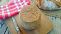 Tomme de Savoie cheese on a table Royalty Free Stock Photo