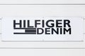 Tommy Hilfiger Denim logo on a wall Royalty Free Stock Photo