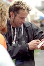 Tommy Lee , Methods-Of-Mayhem , Sign autographs to fans before the concert