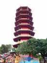 A yellow and red tower of Pagoda Ekayana and white background