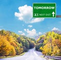 TOMORROW road sign against clear blue sky Royalty Free Stock Photo