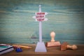 Tomorrow yesterday today. Signpost on wooden table Royalty Free Stock Photo