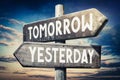 Tomorrow, yesterday - wooden signpost, roadsign with two arrows Royalty Free Stock Photo