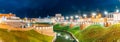 TOMSK, RUSSIA - September 25, 2019: Panoramic view night city with lanterns of embankment of Tom River in granite