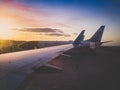 Toned image of beautiful sunset sky over the airplanes in airport Royalty Free Stock Photo