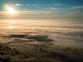 Toned image multicolored sunset above the clouds against the background of the Norwegian Sea