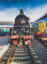 Toned image of old vintage steam train with red soviet star Royalty Free Stock Photo