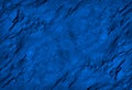 Toned rock texture. Rocky surface. Close-up. Blue stone background with copy space Royalty Free Stock Photo