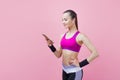Toned young brunet woman stand checking mail on smartphone, have break from training, fit athlete sportswear. Royalty Free Stock Photo