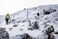 A Mountain climber nears the summit of Mt Tongariro, on the North Island of New Zealand.