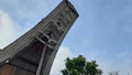 Tongkonan traditional house in North Toraja, Indonesia. Close up photo with sky background.