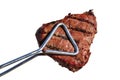 Tongs Holding Grilled Beef Loin Top Sirloin Steak Royalty Free Stock Photo