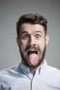 The tongue hanging out man Royalty Free Stock Photo