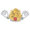 Tongue out fettuccine is put on cartoon board Royalty Free Stock Photo