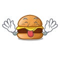 Tongue out hamburger with the cartoon cheese toping