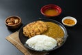 Tonkatsu Curry Rice Japanese deep-fried pork cutlet with Curry rice served with karaage Japanese style fried chicken. Royalty Free Stock Photo