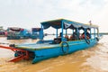 TONLE SAP LAKE SIEM REAP, CAMBODIA, February 2 2018: Unidentified tourists travel on Tourist boats at Tonle Sap Lake in Royalty Free Stock Photo