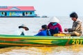 TONLE SAP LAKE SIEM REAP, CAMBODIA, February 2 2018: Unidentified tourists travel on Tourist boats at Tonle Sap Lake in Royalty Free Stock Photo