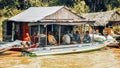 Family meeting in a house on a floating village on Tonle Sap lake