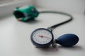 Tonometer on a white background. Diagnostic device for determining blood pressure and pulse rate