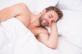 Too early. Good nap. Time to rest. male health and bachelor lifestyle. man fast sleep. Relaxing in bedroom. energy and Royalty Free Stock Photo