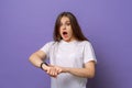 Too late, hurry up. Young beautiful brunette woman in hurry pointing finger on wrist watch, impatience, upset and angry for Royalty Free Stock Photo
