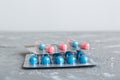 too many different pill cartridges stacked. selective Focus. Packs of blister pills with tablets. Colored pastilles Royalty Free Stock Photo