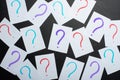 Too Many Questions. Pile of colorful paper notes with question marks. Closeup. Royalty Free Stock Photo