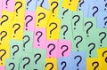 Too Many Questions. Pile of colorful paper notes with question marks. Closeup Royalty Free Stock Photo