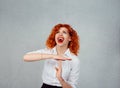 Too many things to do. Young redhead curly woman showing time out hand gesture, frustrated screaming to stop isolated on gray grey Royalty Free Stock Photo