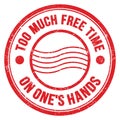 TOO MUCH FREE TIME ON ONE`S HANDS text on red round postal stamp sign Royalty Free Stock Photo